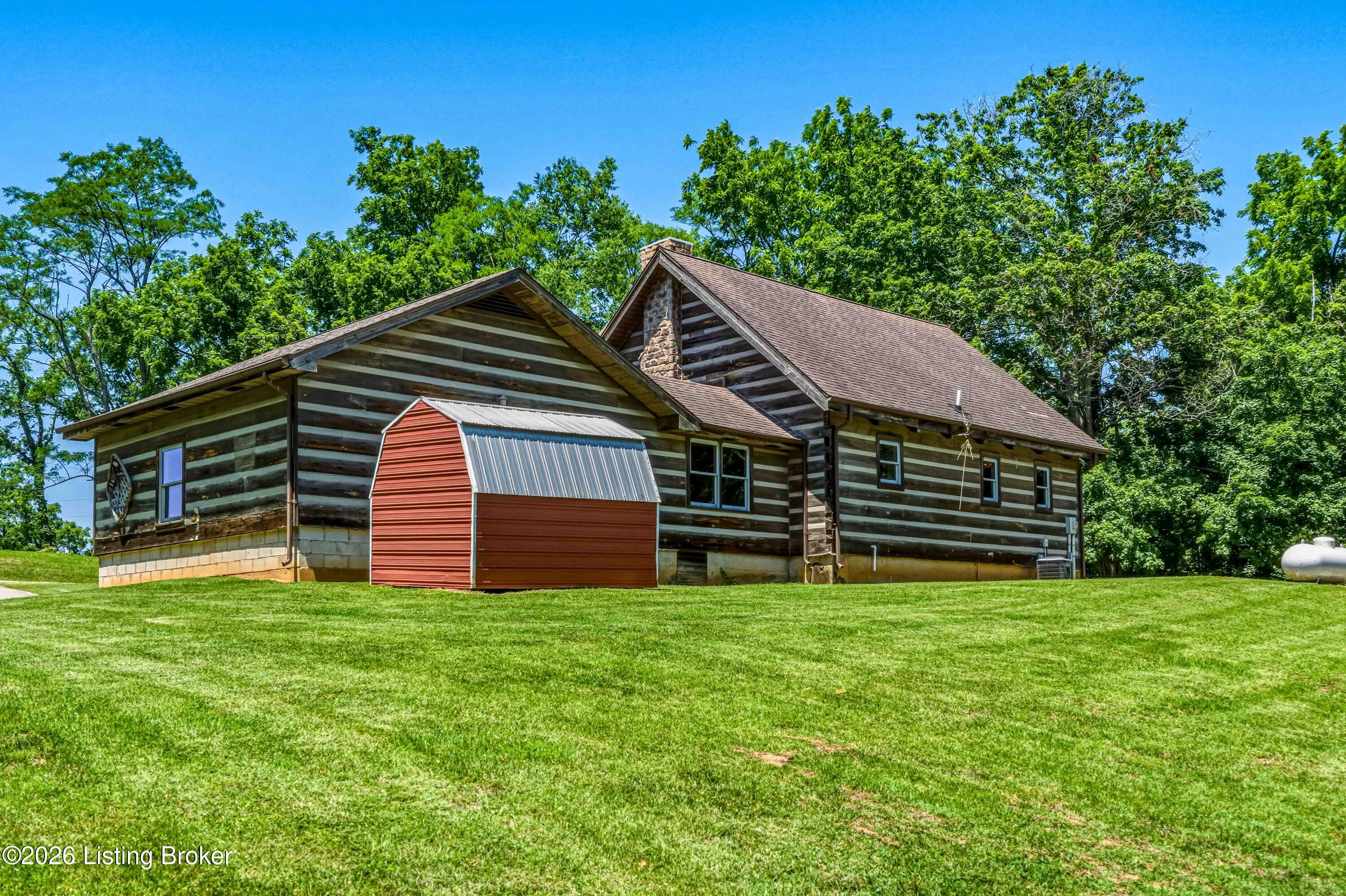 115 River Bend Road Glendale, KY 42740 - Photo 27 of 35 A classic red barn on open ground, adding charm and function to this already special property.