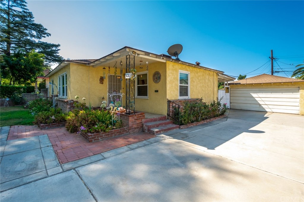 3616 Mariella Street Riverside, CA 92504 - Photo 1 of 1 a front view of a house with a yard