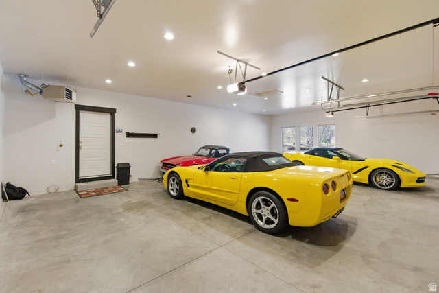 145 Carnesecca Court Mapleton, UT 84664 - Photo 96 of 109 Garage with a heating unit and recessed lighting