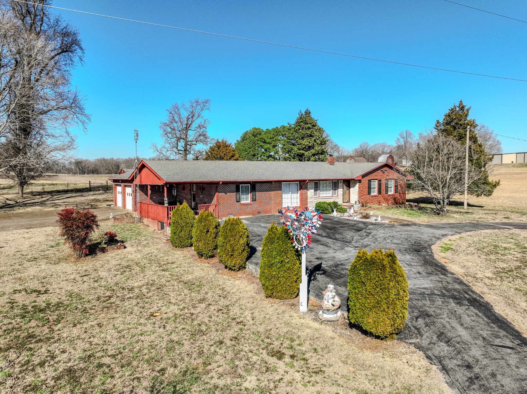 25 Peters Lane Loretto, TN 38469 - Photo 12 of 44 front view of a house with a yard