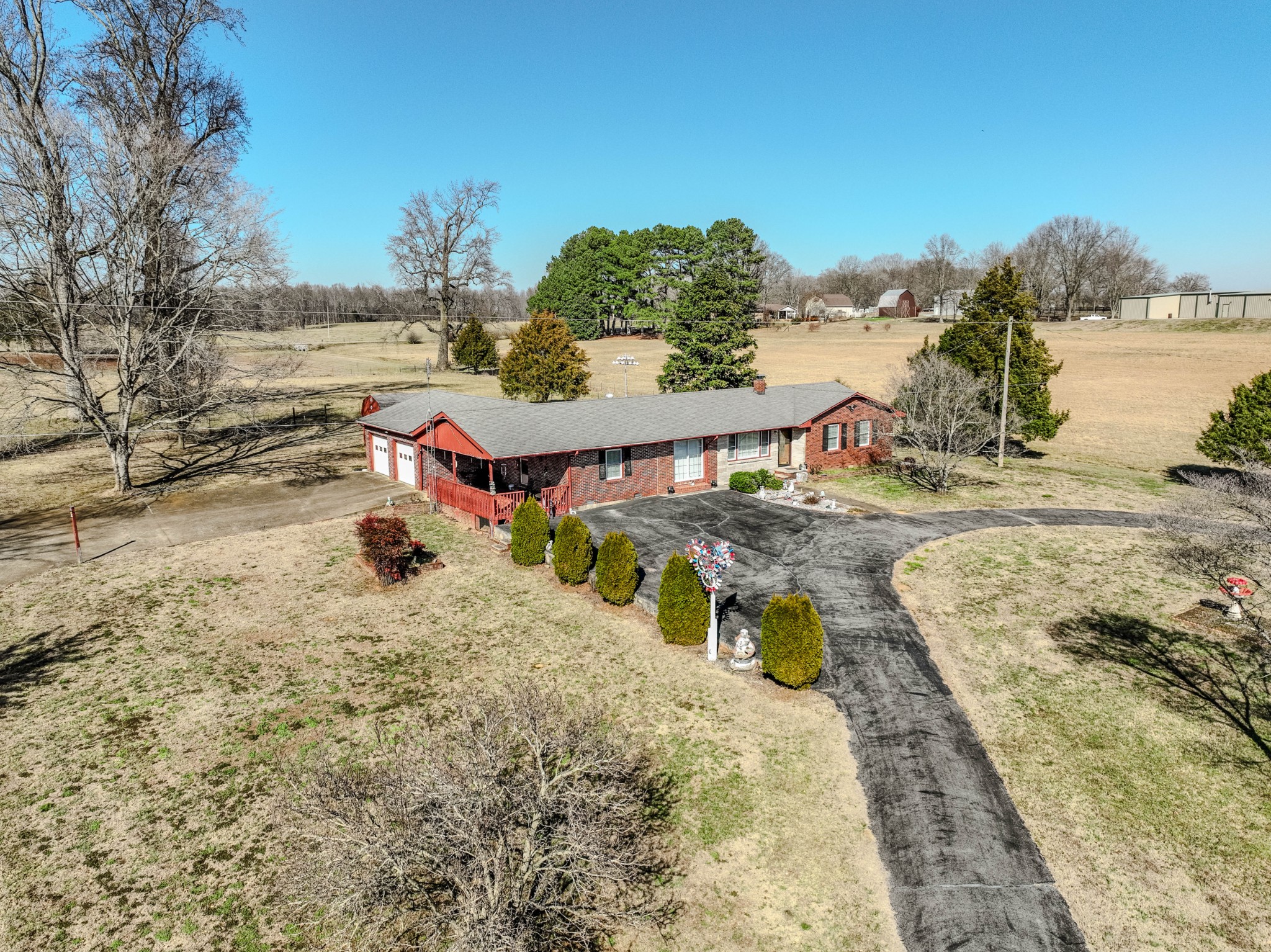 25 Peters Lane Loretto, TN 38469 - Photo 13 of 44 a view of a swimming pool with a lounge chairs