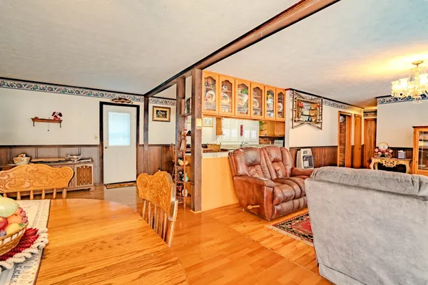 a living room with furniture and a rug