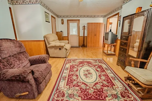 a view of a front of house with a yard