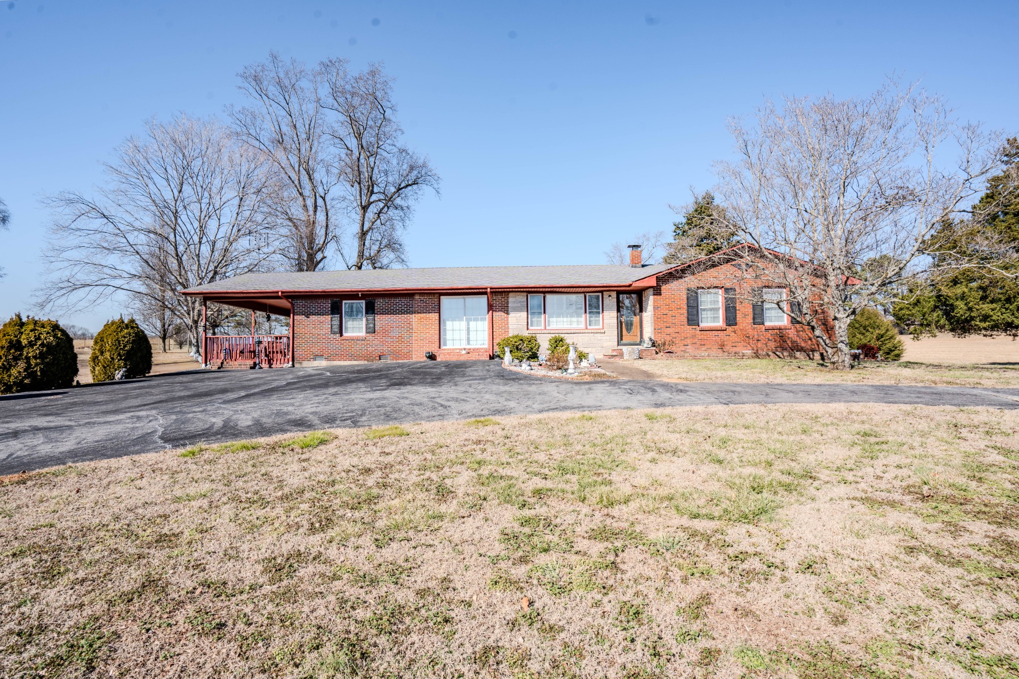 25 Peters Lane Loretto, TN 38469 - Photo 34 of 44 a front view of a house with a yard
