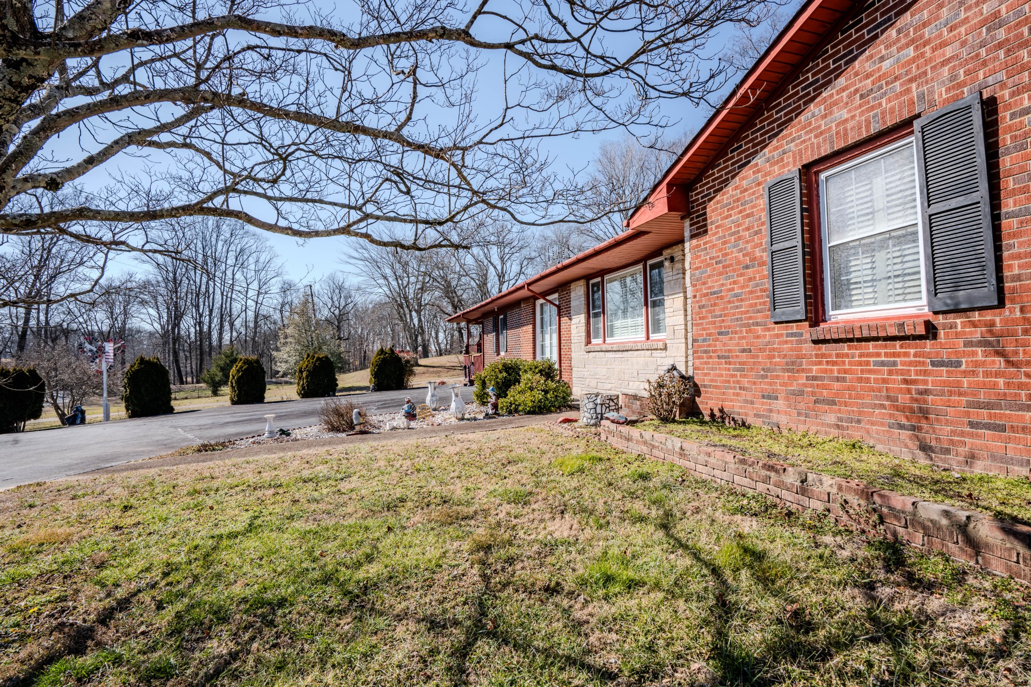 25 Peters Lane Loretto, TN 38469 - Photo 37 of 44 a view of a house with a yard and sitting area