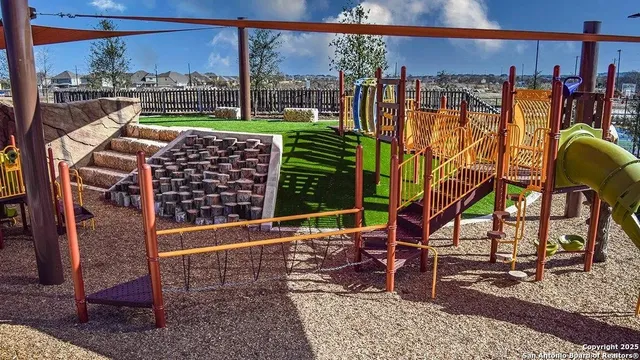 a view of a chairs and table in the outdoor space