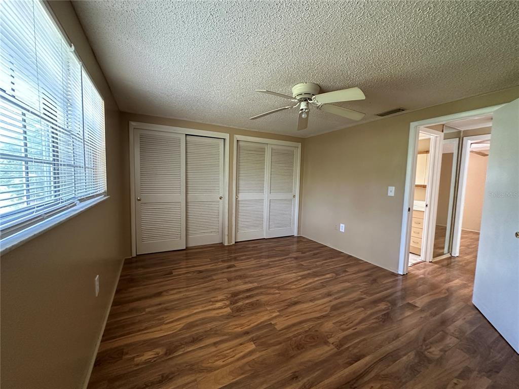 8809 Avondale Lane Hudson, FL 34667 - Photo 16 of 46 a view of an empty room with a window