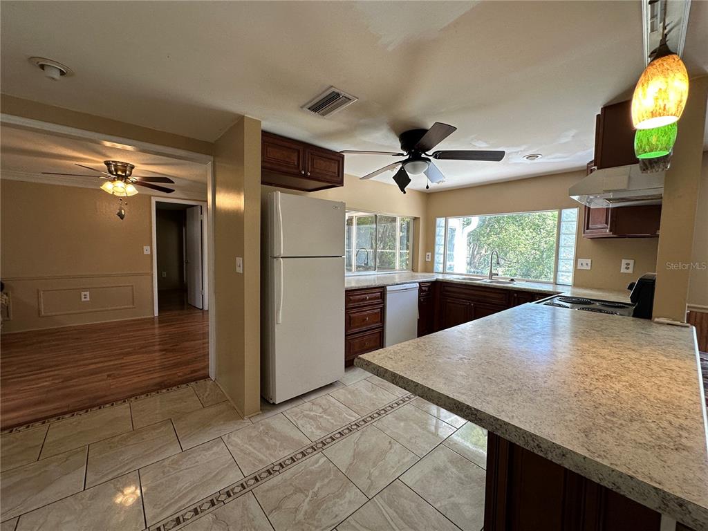 8809 Avondale Lane Hudson, FL 34667 - Photo 20 of 46 a view of kitchen and windows