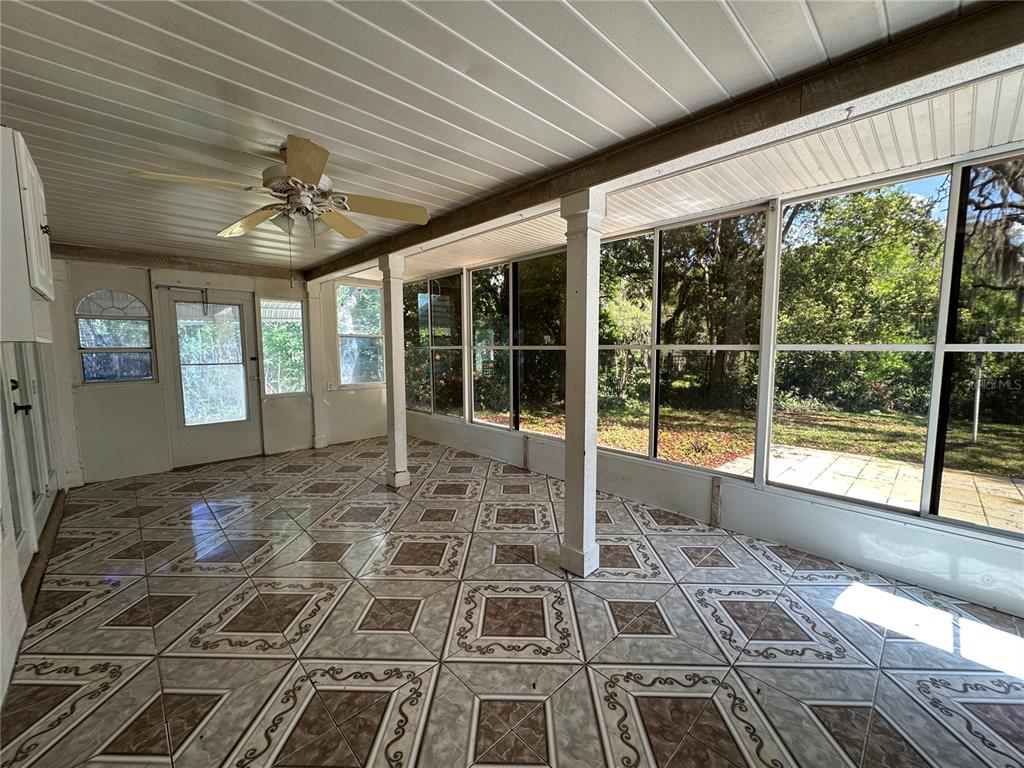 8809 Avondale Lane Hudson, FL 34667 - Photo 26 of 46 a view of empty room with windows