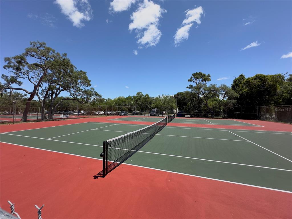 8809 Avondale Lane Hudson, FL 34667 - Photo 38 of 46 a view of a tennis court
