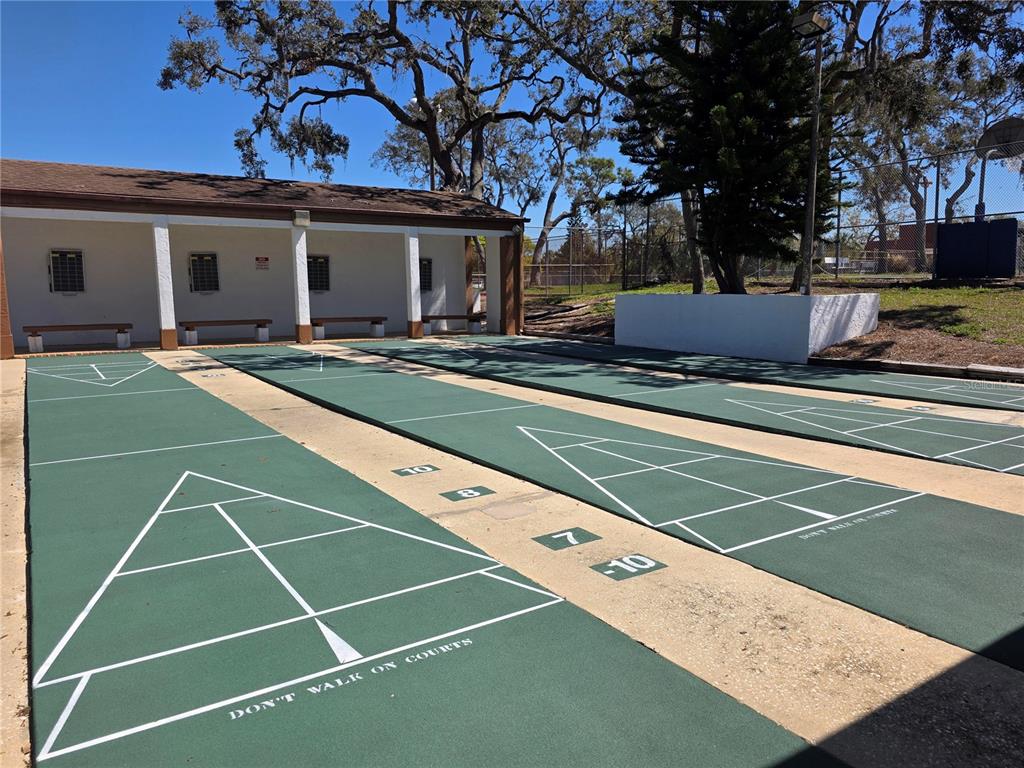 8809 Avondale Lane Hudson, FL 34667 - Photo 45 of 46 a view of a tennis court