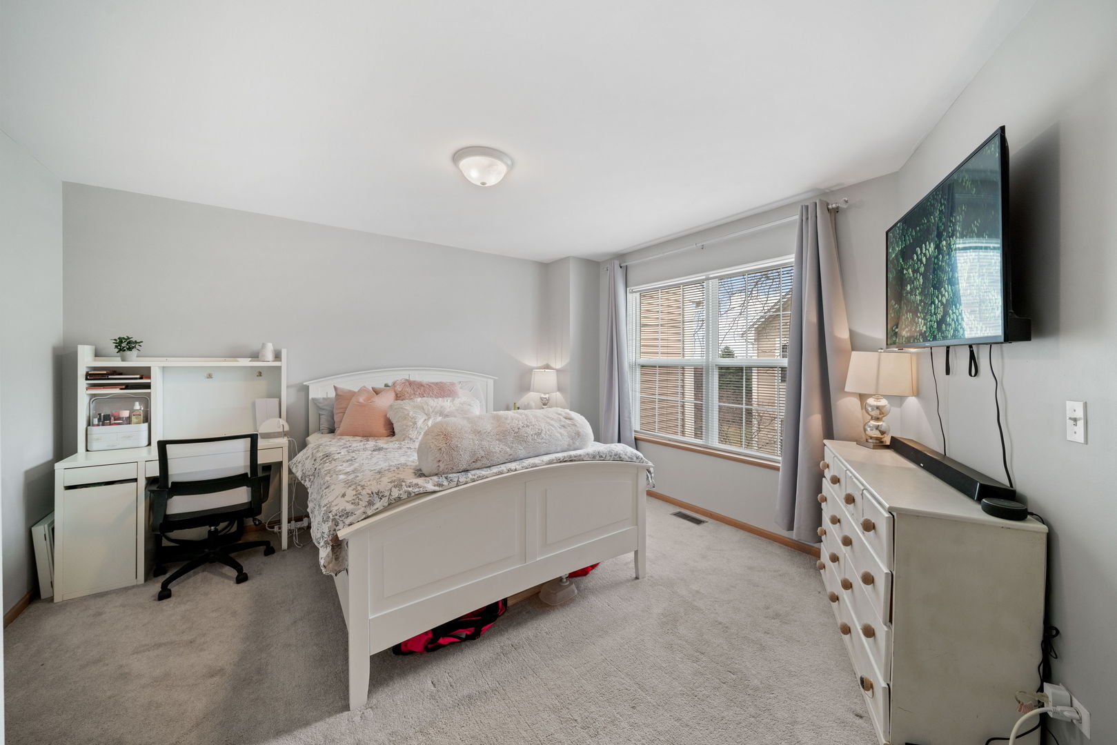 34325 North Barberry Road Round Lake, IL 60073 - Photo 12 of 21 a bed room with furniture and a flat screen tv