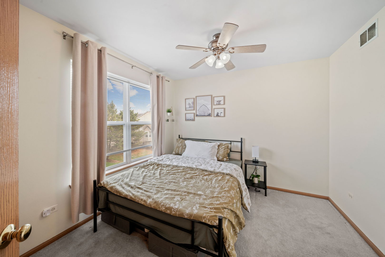 34325 North Barberry Road Round Lake, IL 60073 - Photo 14 of 21 a bedroom with a bed and window