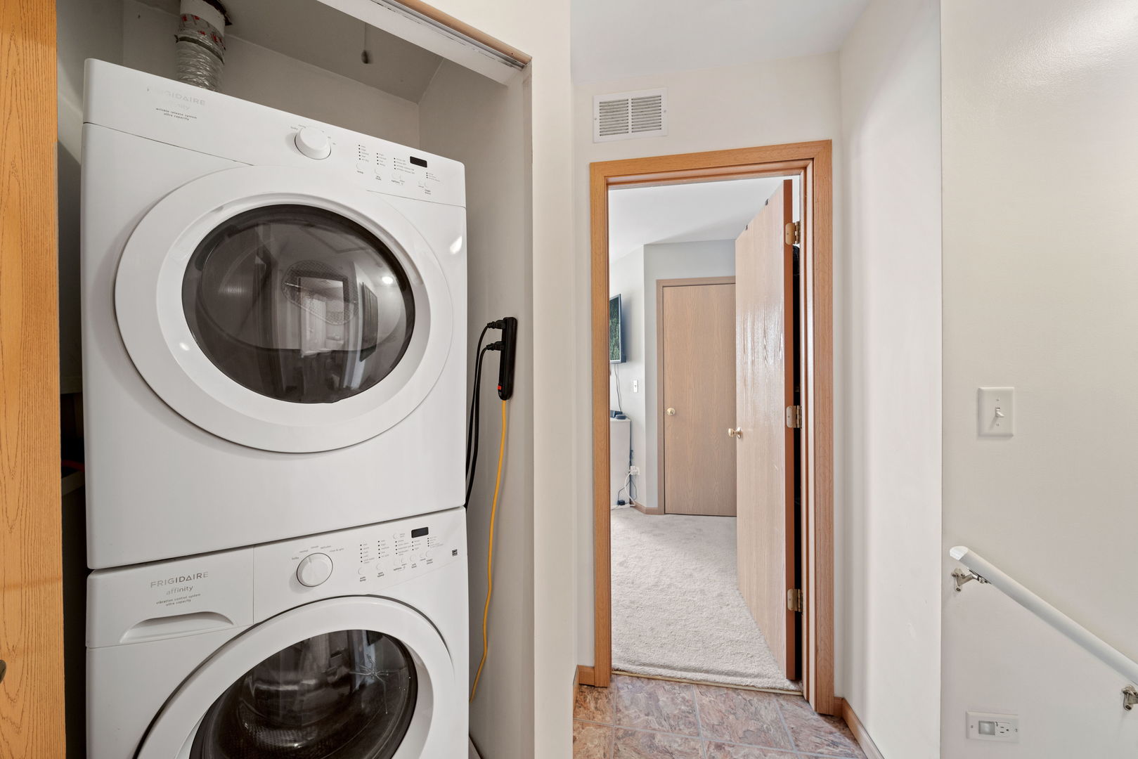 34325 North Barberry Road Round Lake, IL 60073 - Photo 15 of 21 a view of a hallway with washer and dryer