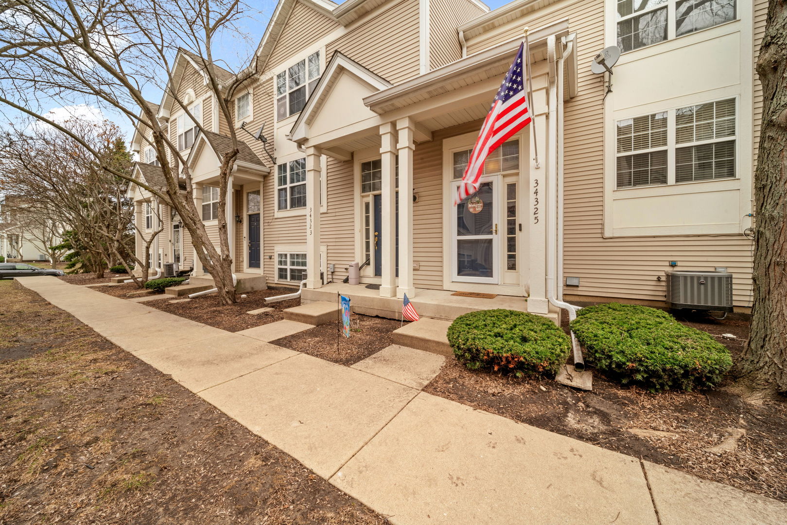 34325 North Barberry Road Round Lake, IL 60073 - Photo 3 of 21 a view of a building with sitting area