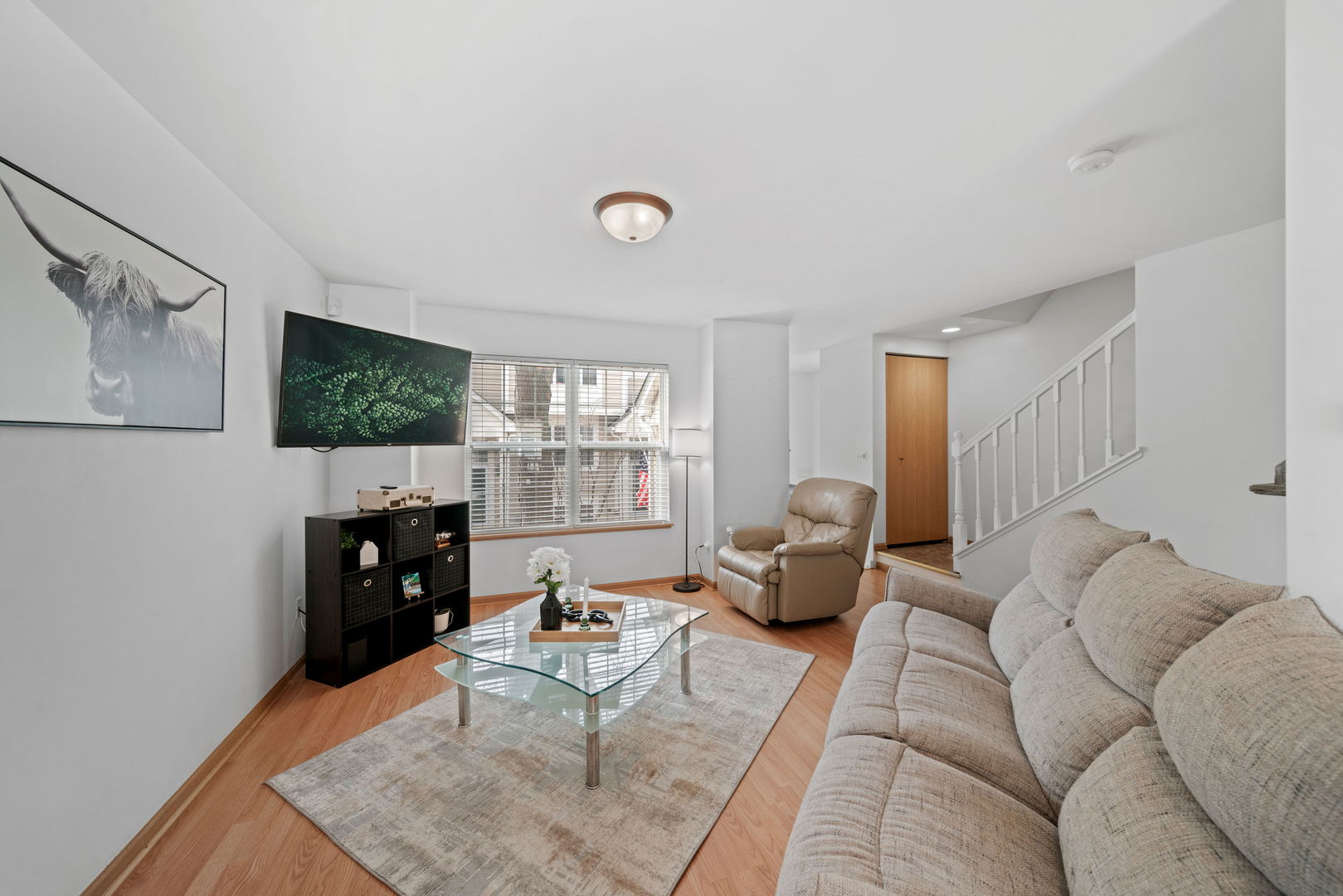 34325 North Barberry Road Round Lake, IL 60073 - Photo 6 of 21 a living room with furniture and a flat screen tv