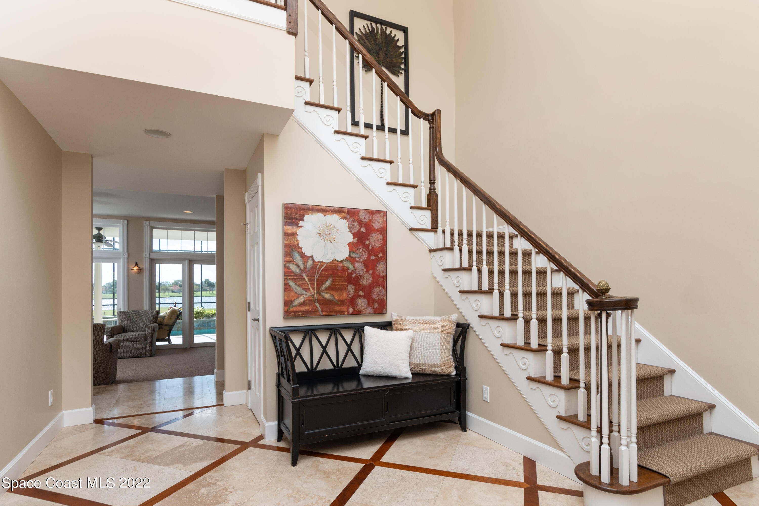 870 Kerry Downs Circle Melbourne, FL 32940 - Photo 18 of 41 a view of entryway livingroom and hall with wooden floor