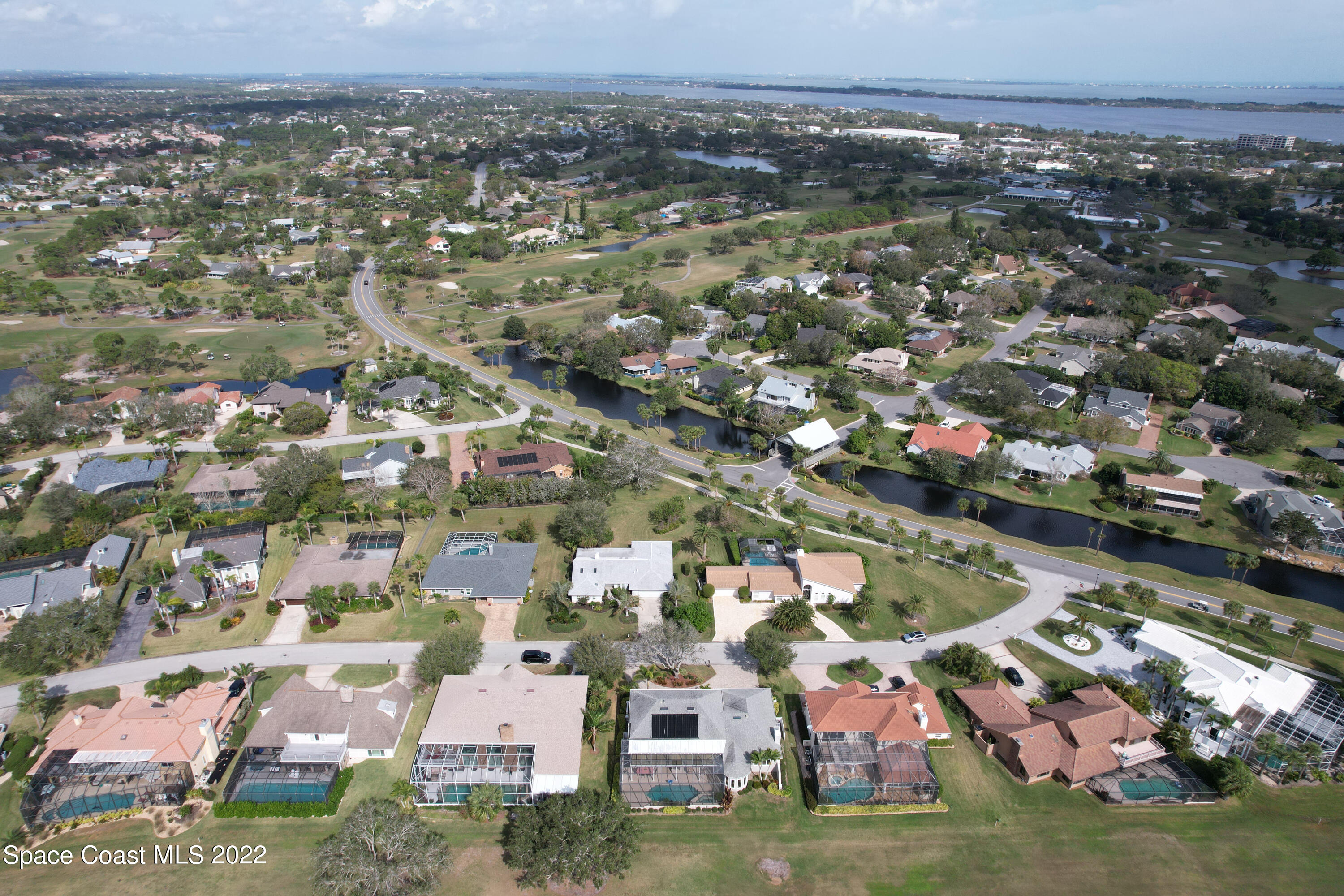 870 Kerry Downs Circle Melbourne, FL 32940 - Photo 38 of 41 an aerial view of residential houses with outdoor space