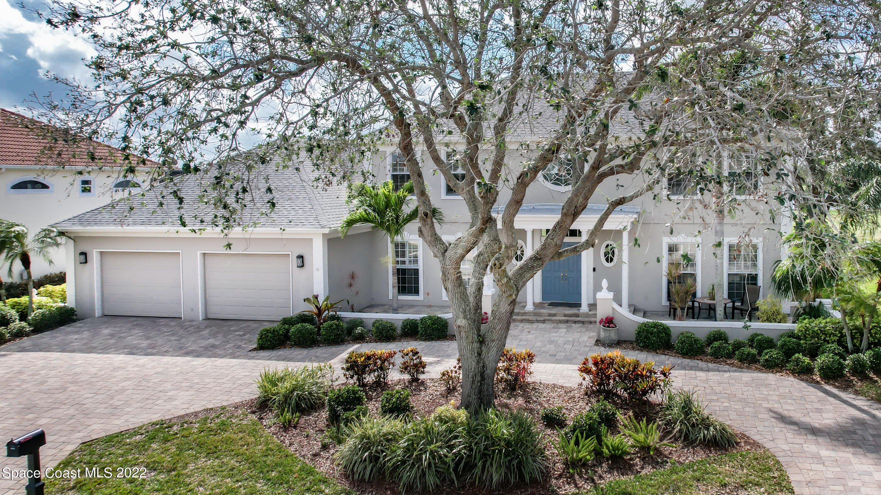 870 Kerry Downs Circle Melbourne, FL 32940 - Photo 40 of 41 a front view of a house with garden