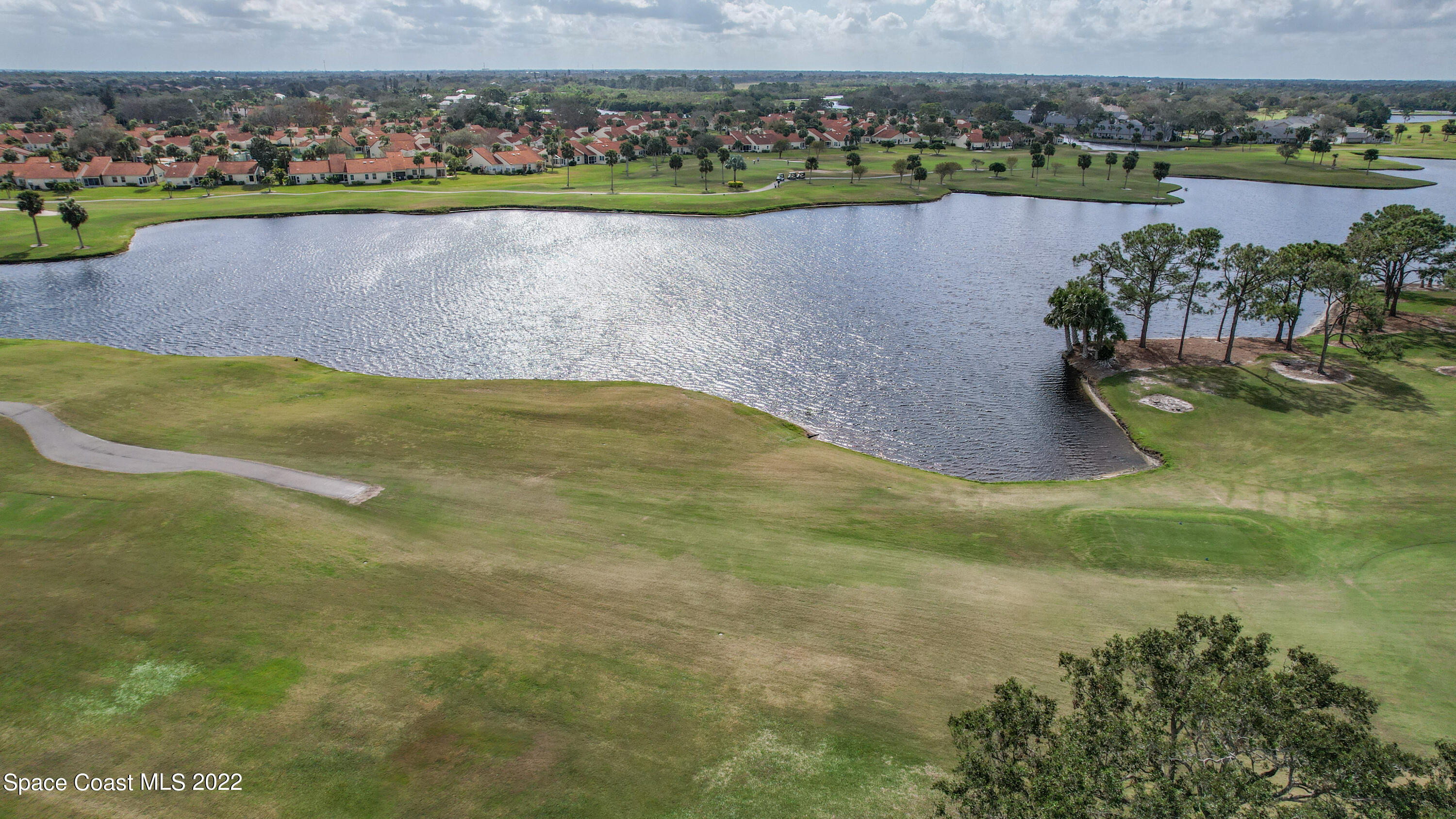 870 Kerry Downs Circle Melbourne, FL 32940 - Photo 5 of 41 a view of a lake with a city view