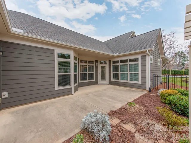 a house view with a garden space