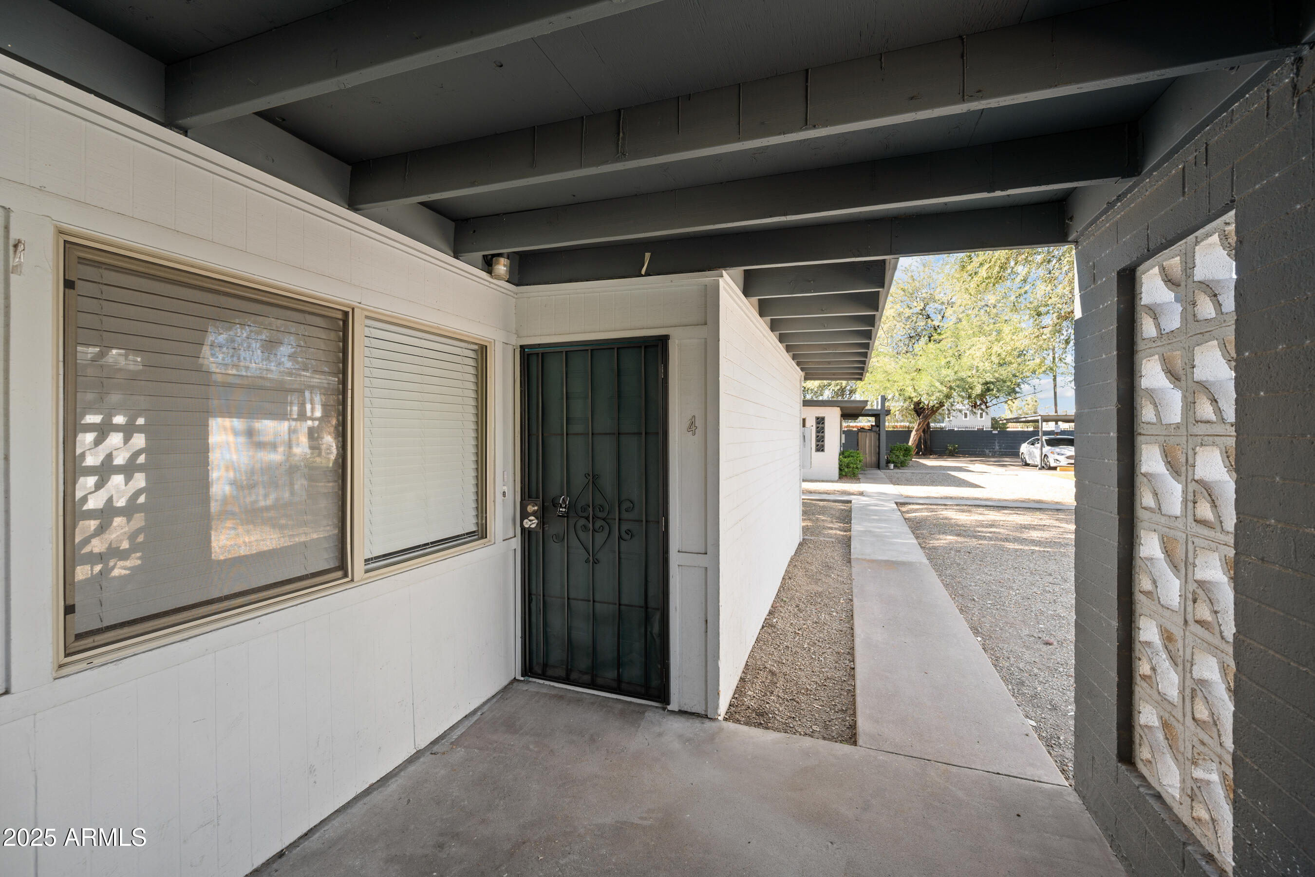 1518 West Colter Street, Unit 9 Phoenix, AZ 85015 - Photo 2 of 26 a view of a porch