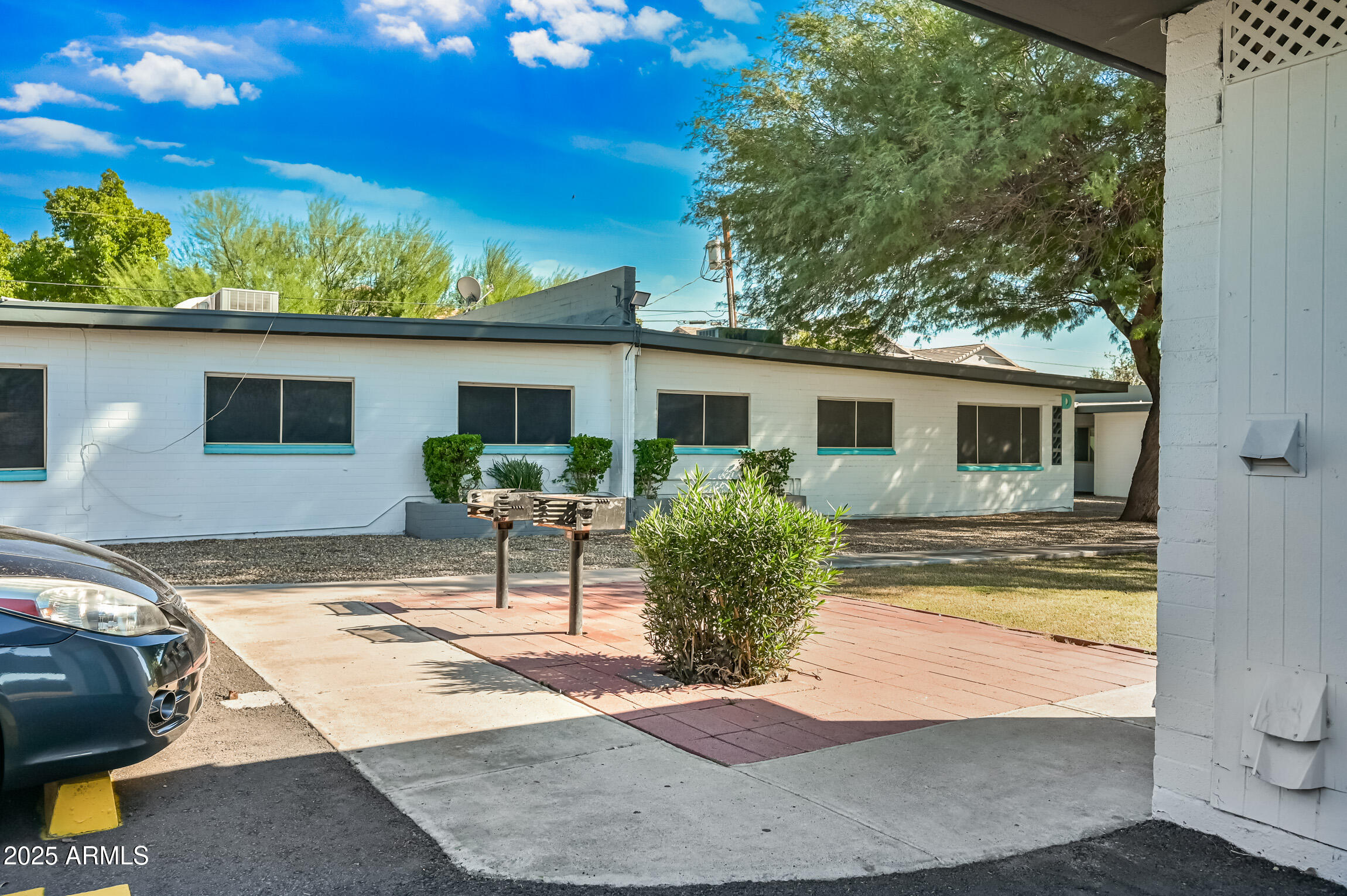 1518 West Colter Street, Unit 9 Phoenix, AZ 85015 - Photo 25 of 26 a view of a house with backyard and sitting area