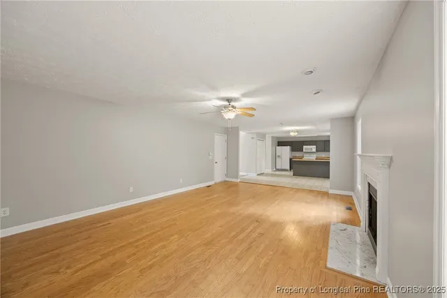 a view of a livingroom with a fireplace