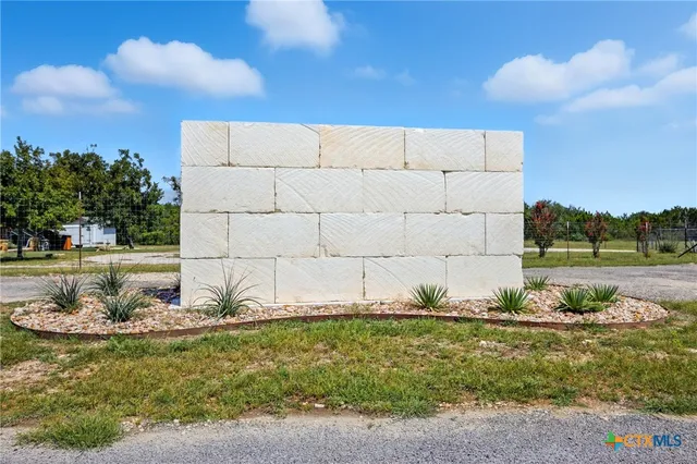 a view of an ocean beach and outdoor space