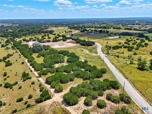 a view of a city with an ocean view