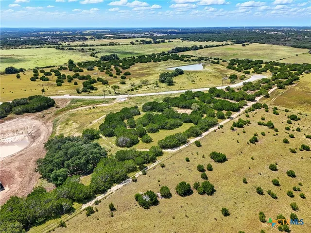 a view of a lake with a city