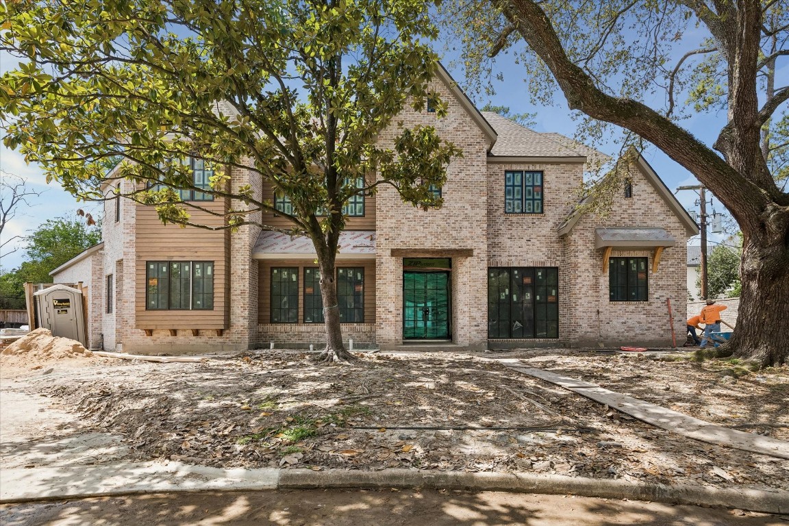 403 Trails Court Houston, TX 77024 - Photo 6 of 31 a view of a house with a tree in front