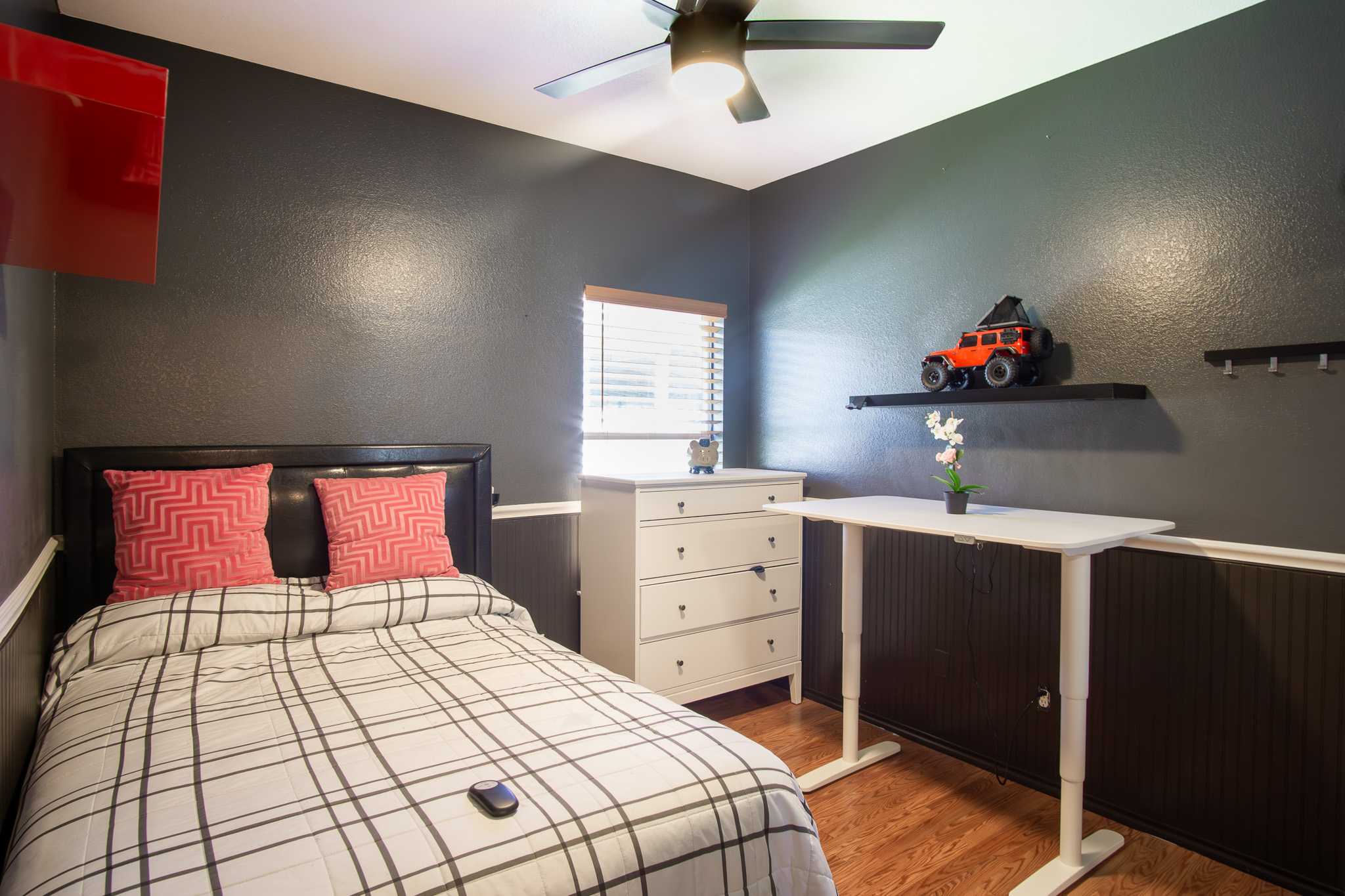 11500 Dimmit Street Manor, TX 78653 - Photo 13 of 20 a bedroom with a bed and a dresser