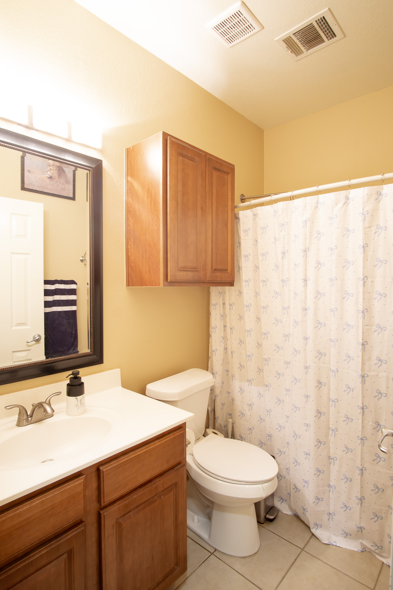 11500 Dimmit Street Manor, TX 78653 - Photo 15 of 20 a bathroom with a sink a toilet and shower