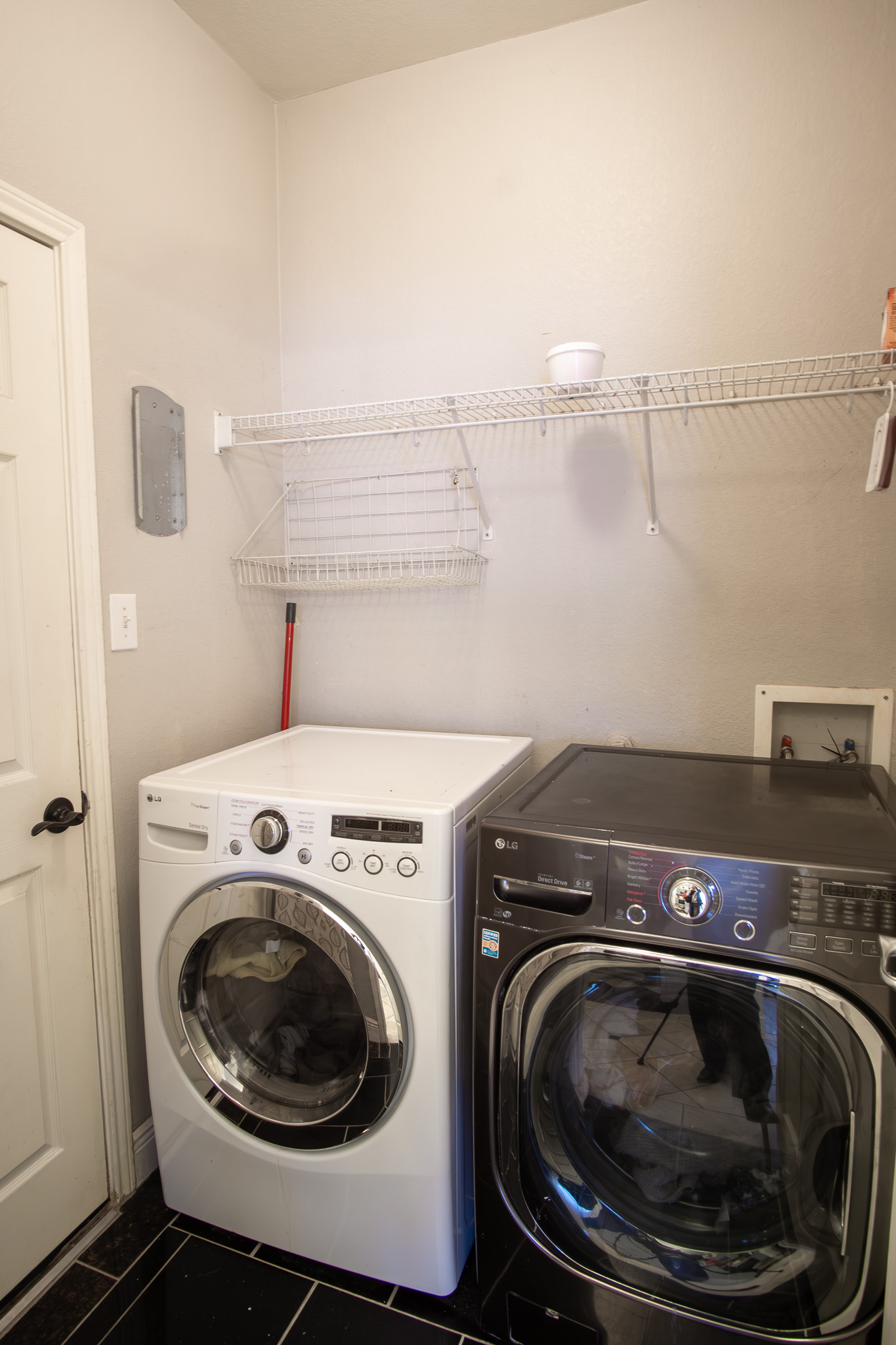11500 Dimmit Street Manor, TX 78653 - Photo 20 of 20 a utility room with dryer and washer