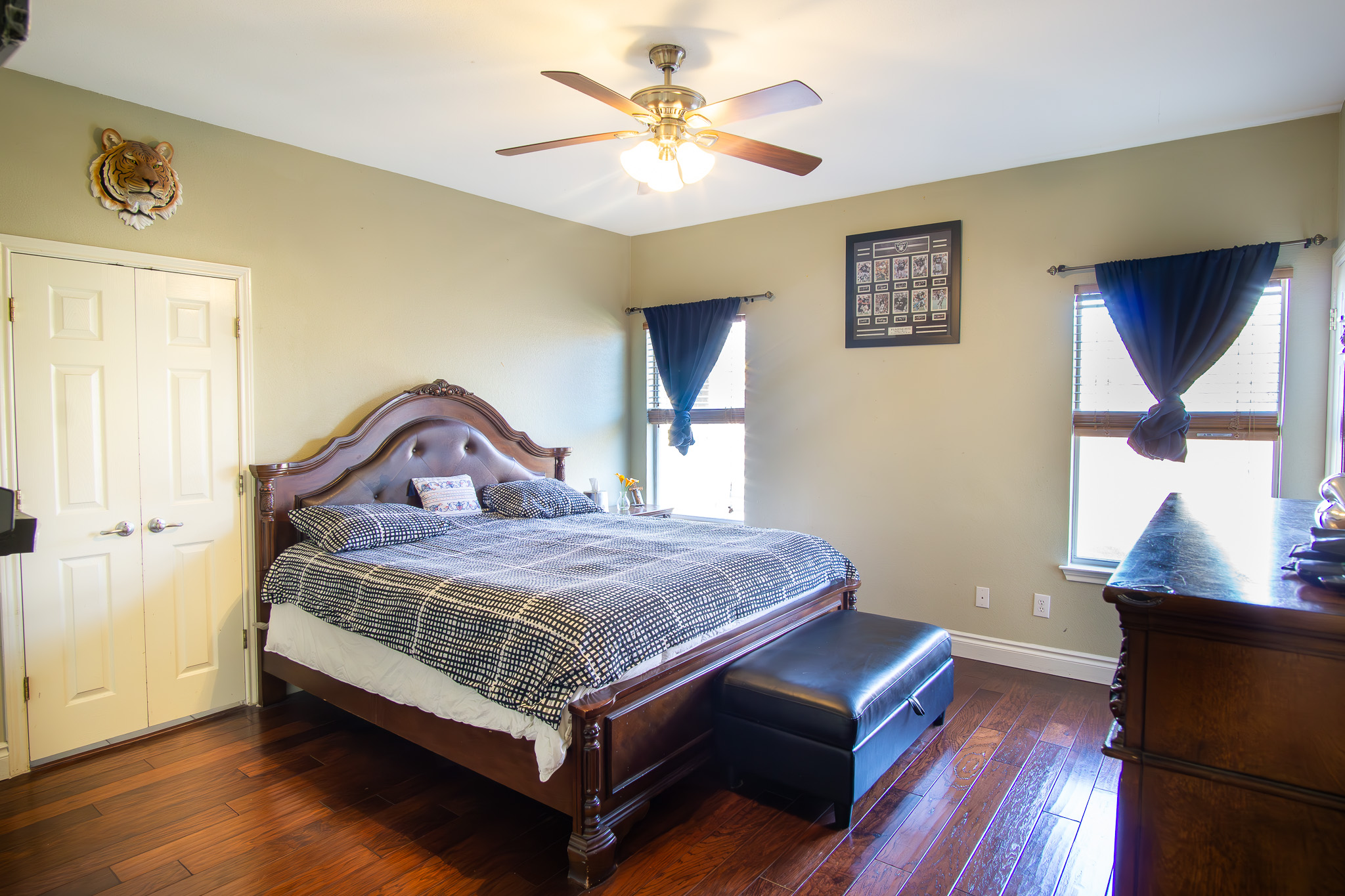 11500 Dimmit Street Manor, TX 78653 - Photo 10 of 20 a bedroom with a bed a window and lamps