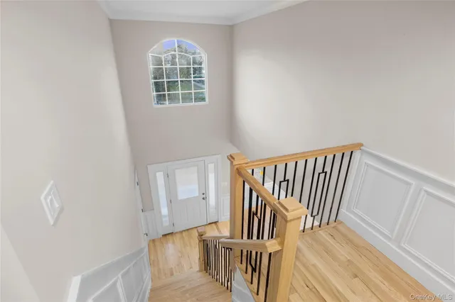 a view of entryway with wooden floor