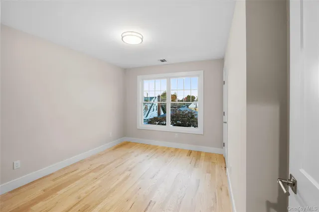 an empty room with window