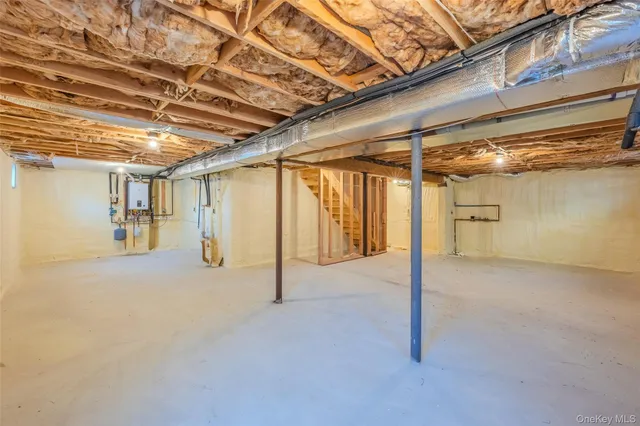 a view of a room with wooden walls
