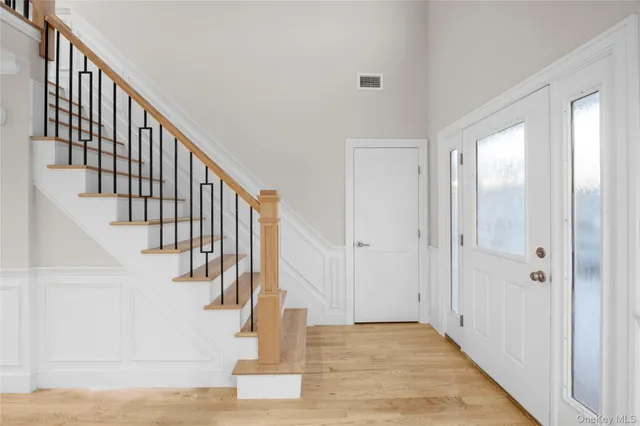 a view of hallway with stairs