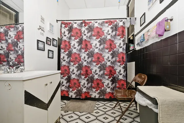 a bathroom with a sink and a mirror