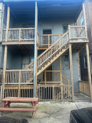 a view of a house with a deck