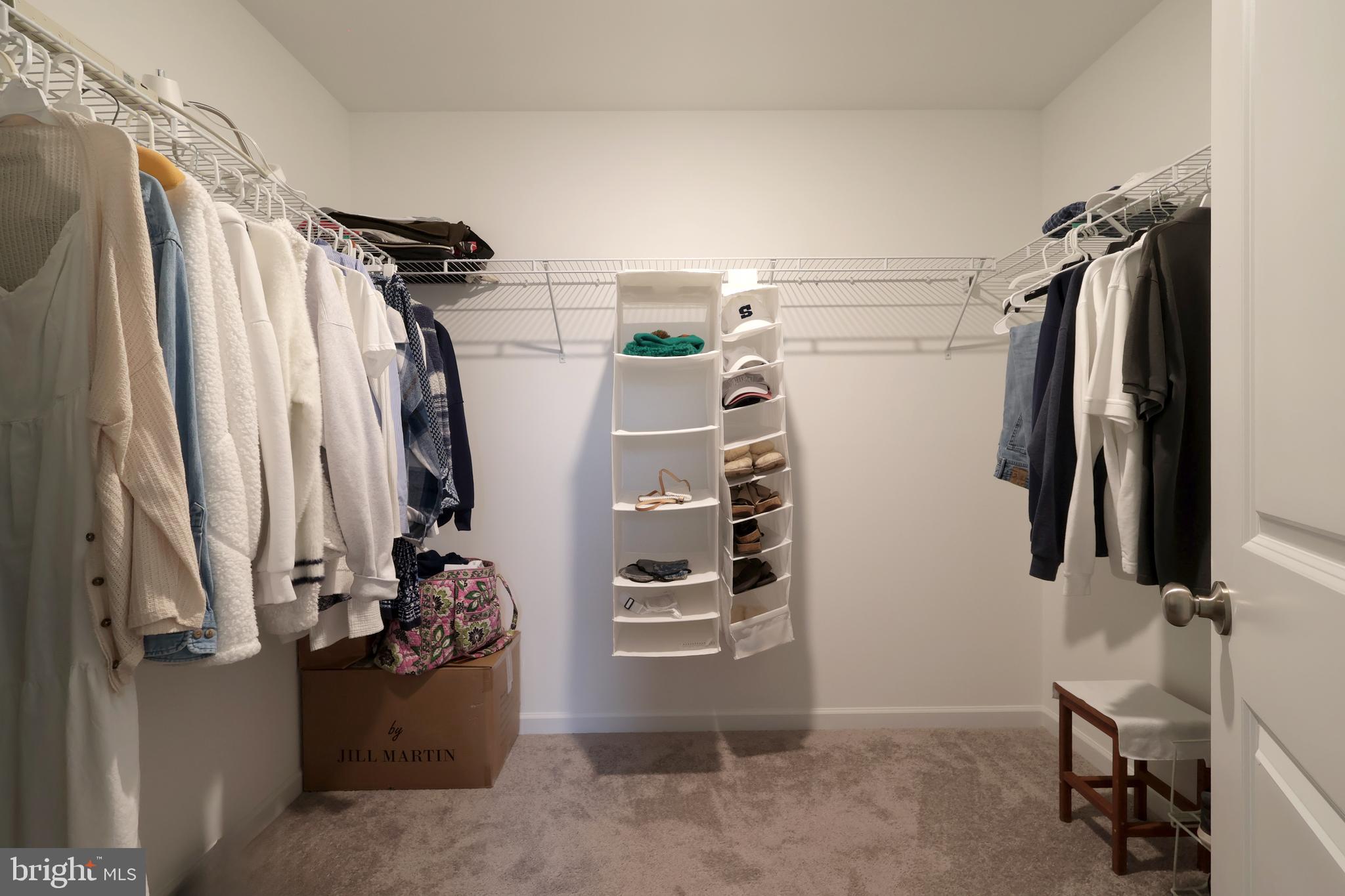 154 Magnolia Lane State College, PA 16803 - Photo 35 of 60 a view of walk in closet with clothes and shoes