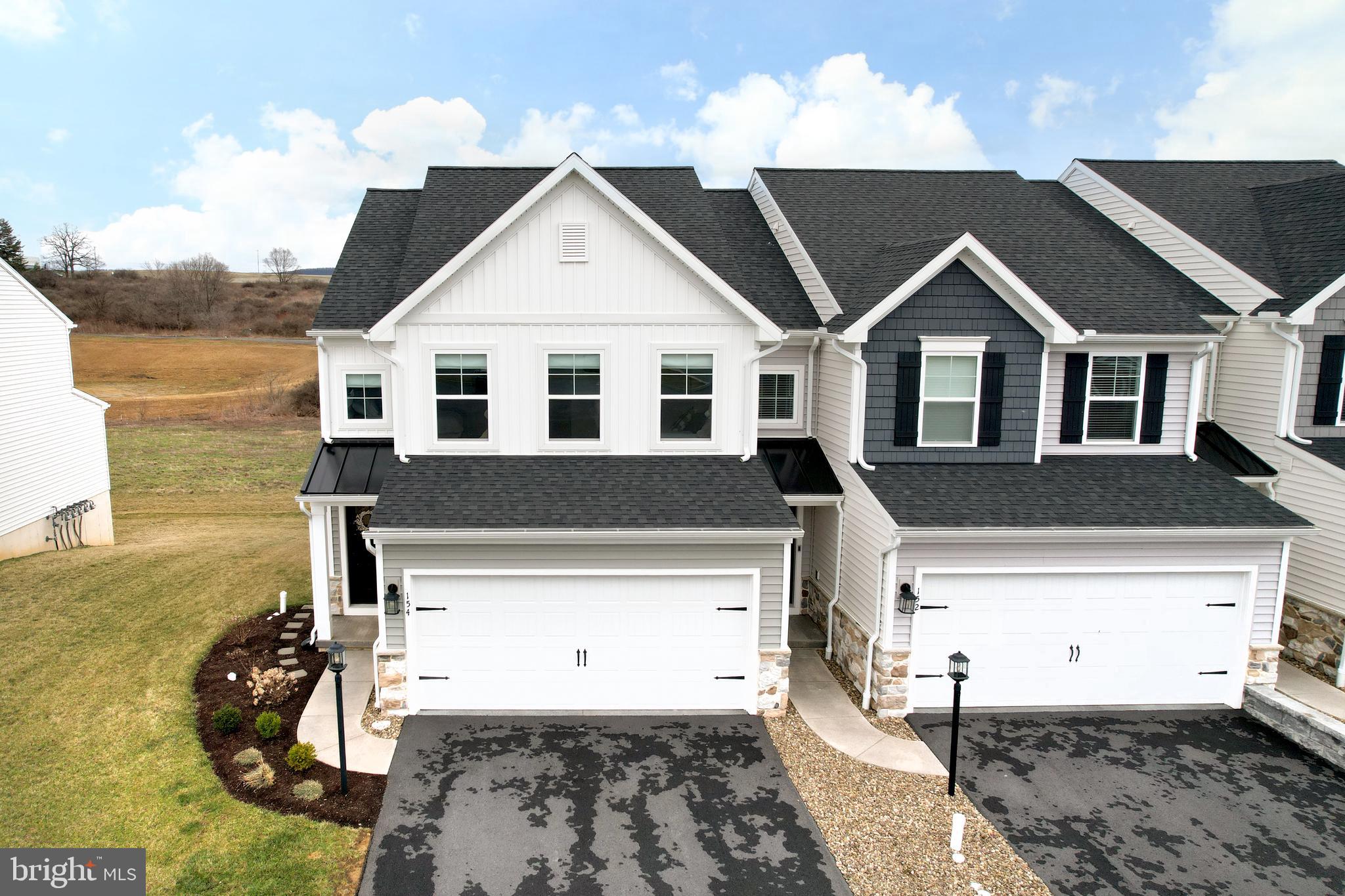 154 Magnolia Lane State College, PA 16803 - Photo 59 of 60 a front view of a house with a yard