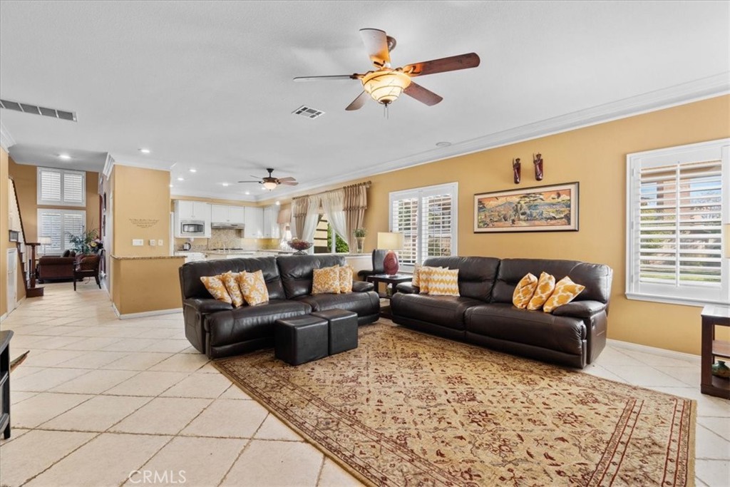 5531 San Carlos Court Rancho Cucamonga, CA 91739 - Photo 15 of 54 a living room with furniture and kitchen view