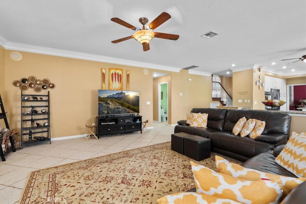 5531 San Carlos Court Rancho Cucamonga, CA 91739 - Photo 16 of 54 a living room with furniture and a flat screen tv