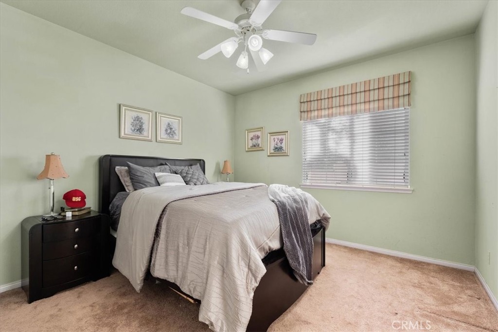 5531 San Carlos Court Rancho Cucamonga, CA 91739 - Photo 17 of 54 a bedroom with a bed and a window