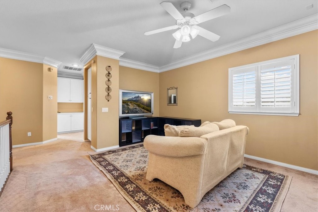 5531 San Carlos Court Rancho Cucamonga, CA 91739 - Photo 23 of 54 a living room with furniture and a rug