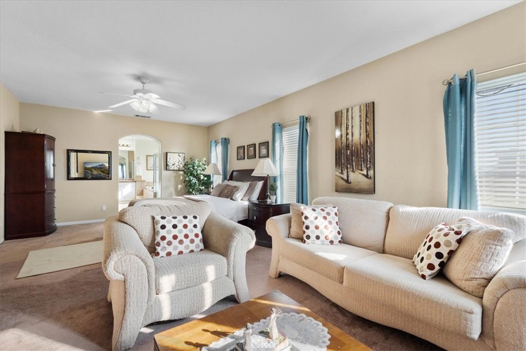 5531 San Carlos Court Rancho Cucamonga, CA 91739 - Photo 25 of 54 a living room with furniture and a large window