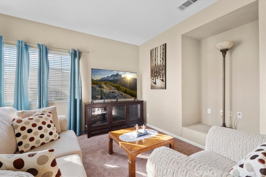 5531 San Carlos Court Rancho Cucamonga, CA 91739 - Photo 26 of 54 a bedroom with furniture and wooden floor